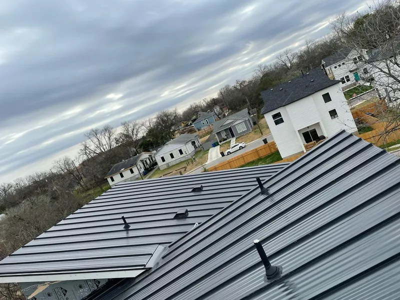 Standing seam metal roof panels with vents for Skylight Repair in Wright